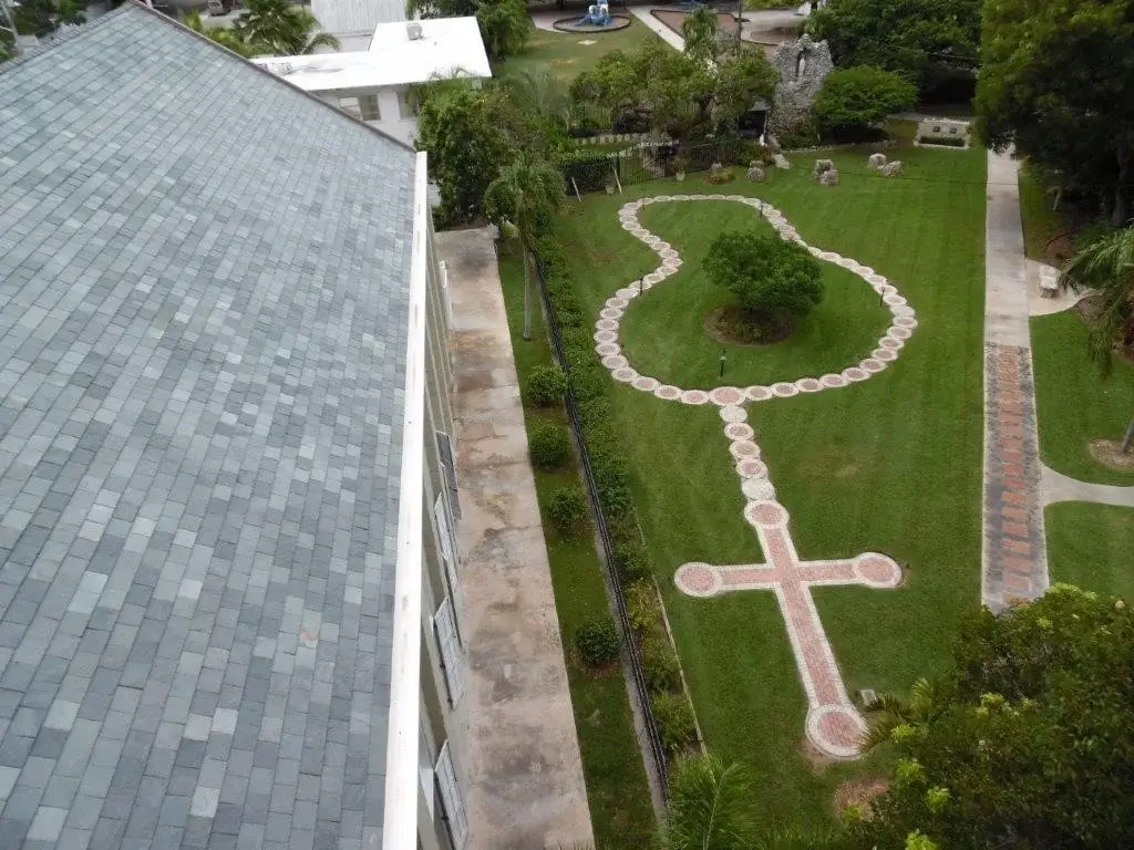 church roof with new roof and courtyard