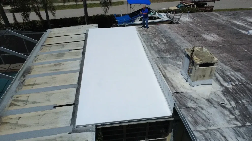 new roof attachment with flat white roof